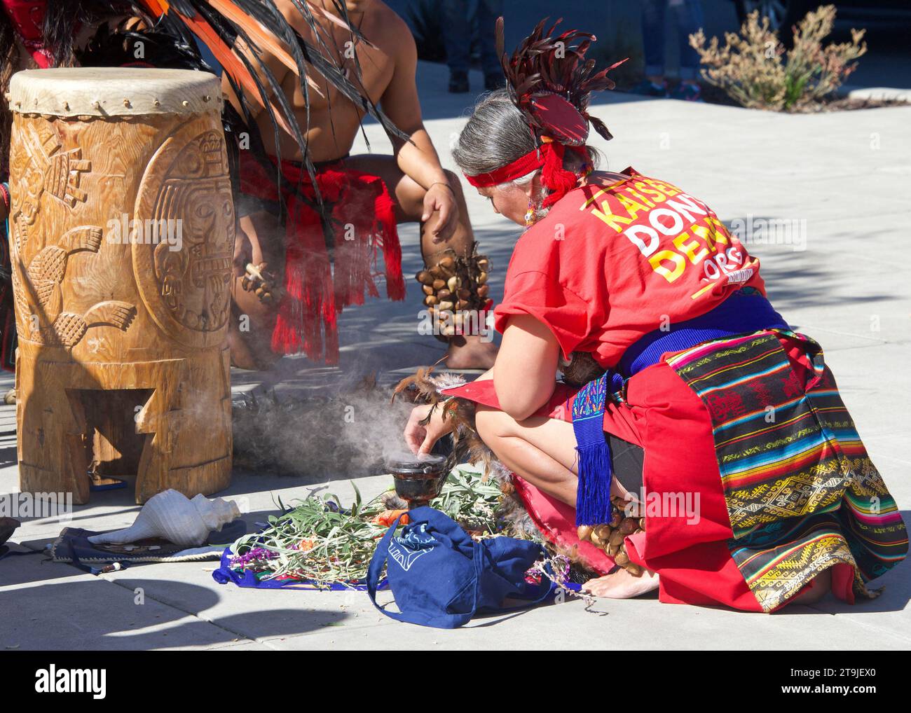 Oakland, CA - August 22, 2022:  Mental Health Care workers protesting outside Kaiser Medical Center on Broadway. Aztec dancers performing to give ener Stock Photo