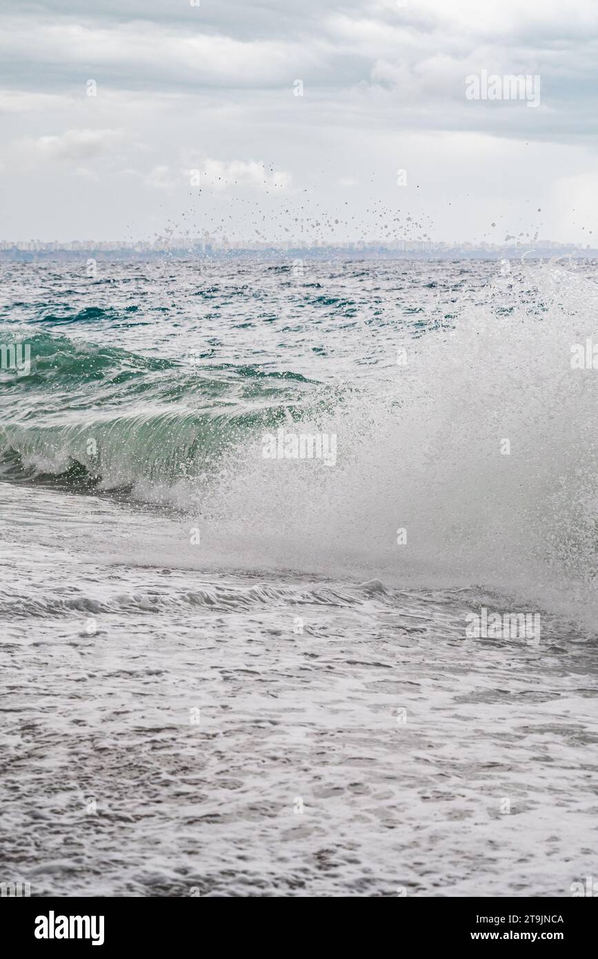 Big waves hitting the Konyaalti coast on a stormy day Stock Photo