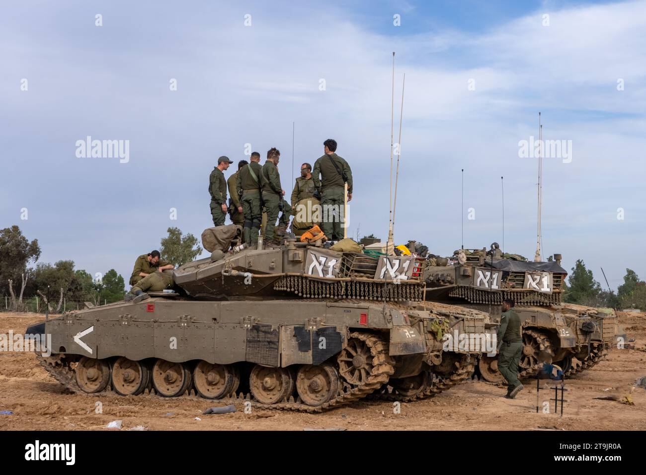 November 23, 2033 Israeli armoured forces parked on the outskirts of the Gaza Strip preparing to enter in order to release the abducted civilians and Stock Photo