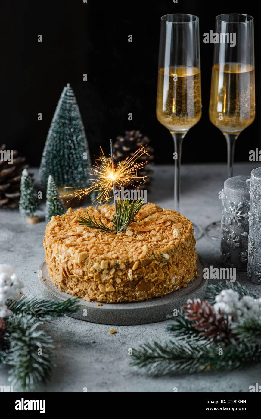 cake with sparklers and champagne Stock Photo