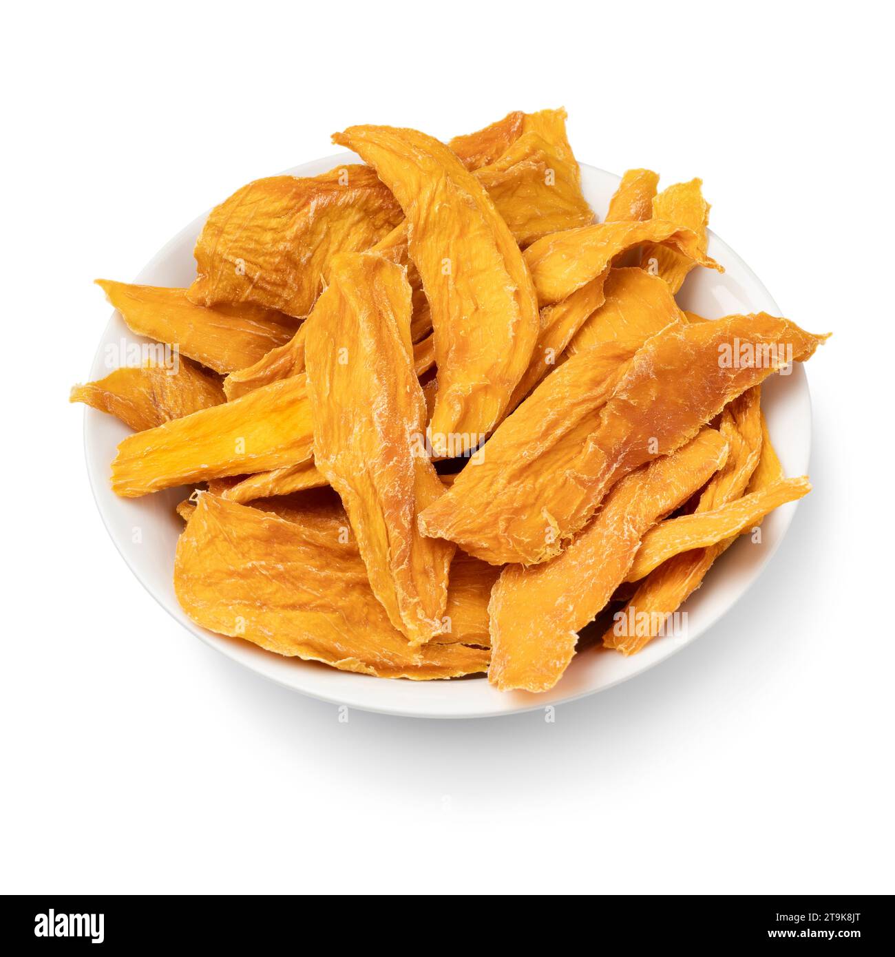 Bowl with unsweetened dried mango chips without added sugar close up isolated on white