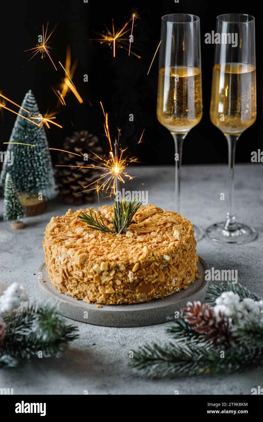 cake with sparklers and champagne Stock Photo