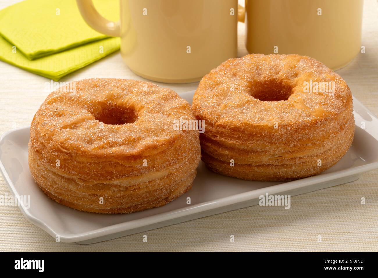 Plate with a pair of tasty sweet Cronuts close up Stock Photo