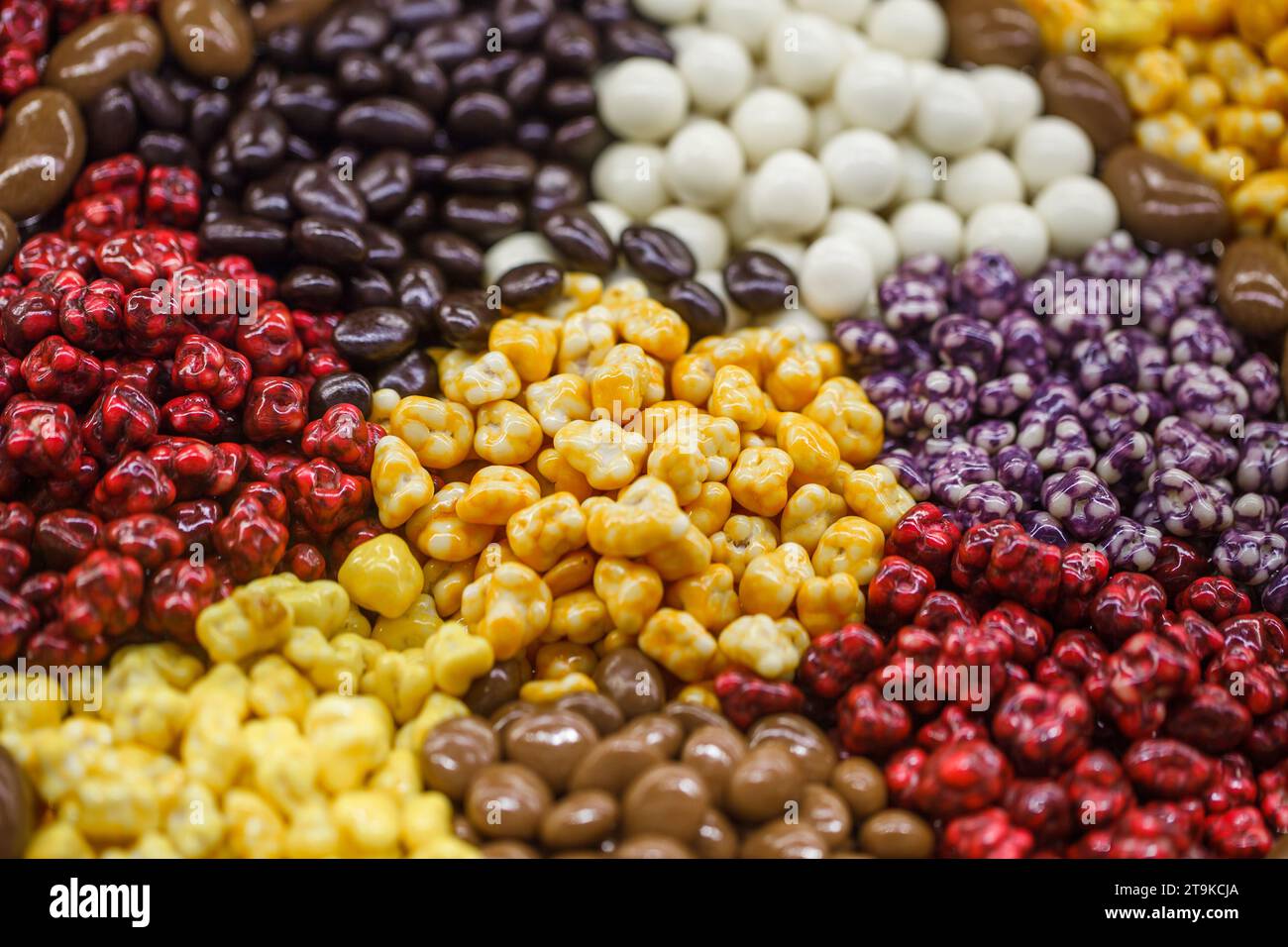 Sweets in bulk, chocolate and in a multicolored glaze Stock Photo Alamy