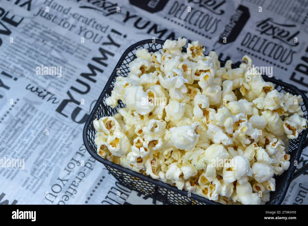 popcorn snacks in the chips basket Stock Photo Alamy