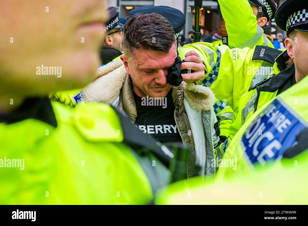 London, UK. 26th Nov, 2023. Far right leader Tommy Robinson tries to piggy back the march but is asked to leave by the police and then arrested outside the Royal Courts of Justice - Anti-semistism protest march. Credit: Guy Bell/Alamy Live News Stock Photo