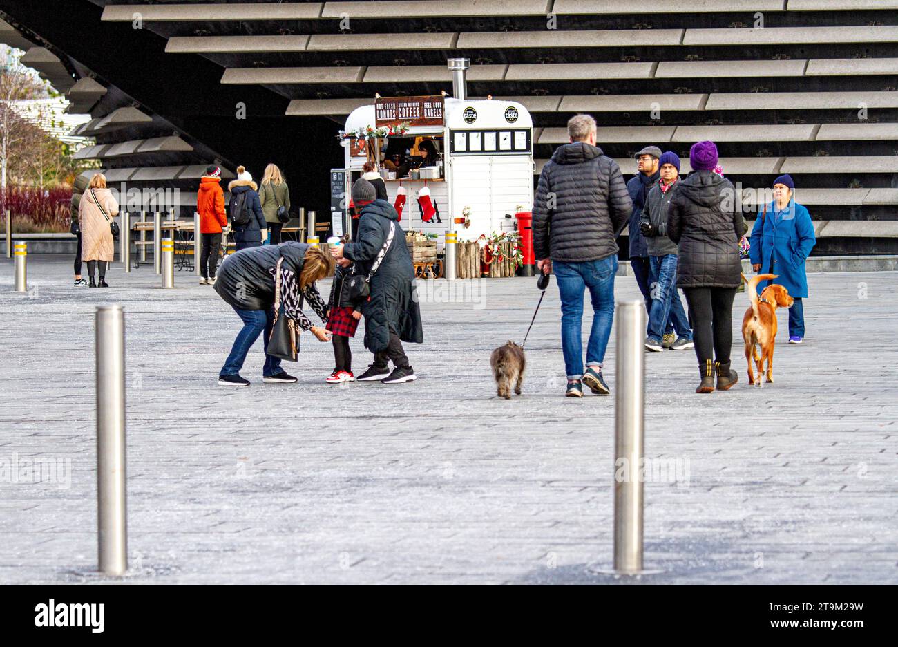 Dundee, Tayside, Scotland, UK. 26th Nov, 2023. UK Weather: Tayside is experiencing bitterly cold weather with temperatures reached 1°C. Tourists and locals are braving the freezing cold winter weather to visit the V&A Design Museum along the Dundee Waterfront on a Sunday morning. Credit: Dundee Photographics/Alamy Live News Stock Photo