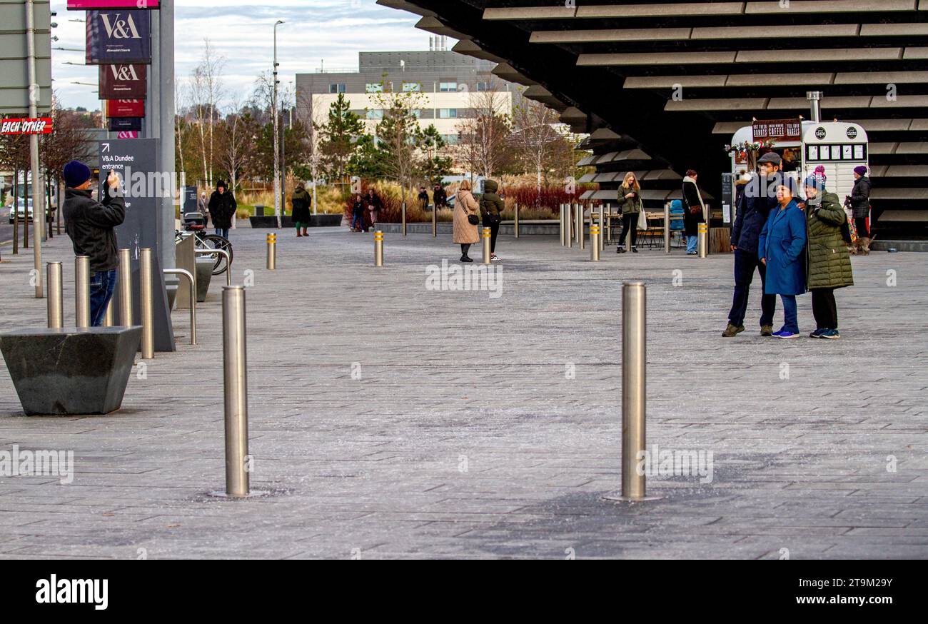 Dundee, Tayside, Scotland, UK. 26th Nov, 2023. UK Weather: Tayside is experiencing bitterly cold weather with temperatures reached 1°C. Tourists and locals are braving the freezing cold winter weather to visit the V&A Design Museum along the Dundee Waterfront on a Sunday morning. Credit: Dundee Photographics/Alamy Live News Stock Photo