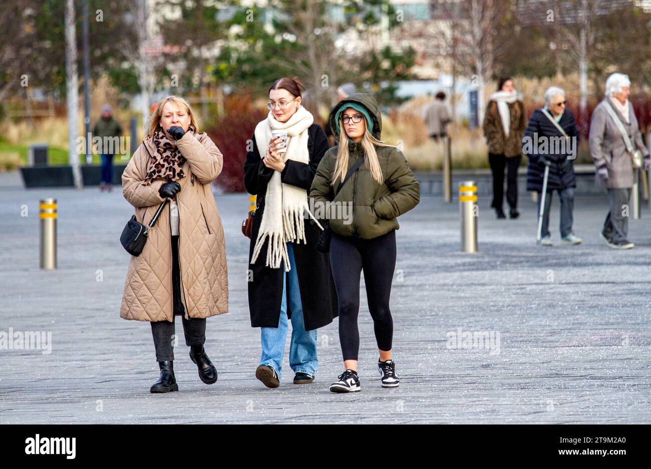 Dundee, Tayside, Scotland, UK. 26th Nov, 2023. UK Weather: Tayside is experiencing bitterly cold weather with temperatures reached 1°C. Tourists and locals are braving the freezing cold winter weather to visit the V&A Design Museum along the Dundee Waterfront on a Sunday morning. Credit: Dundee Photographics/Alamy Live News Stock Photo