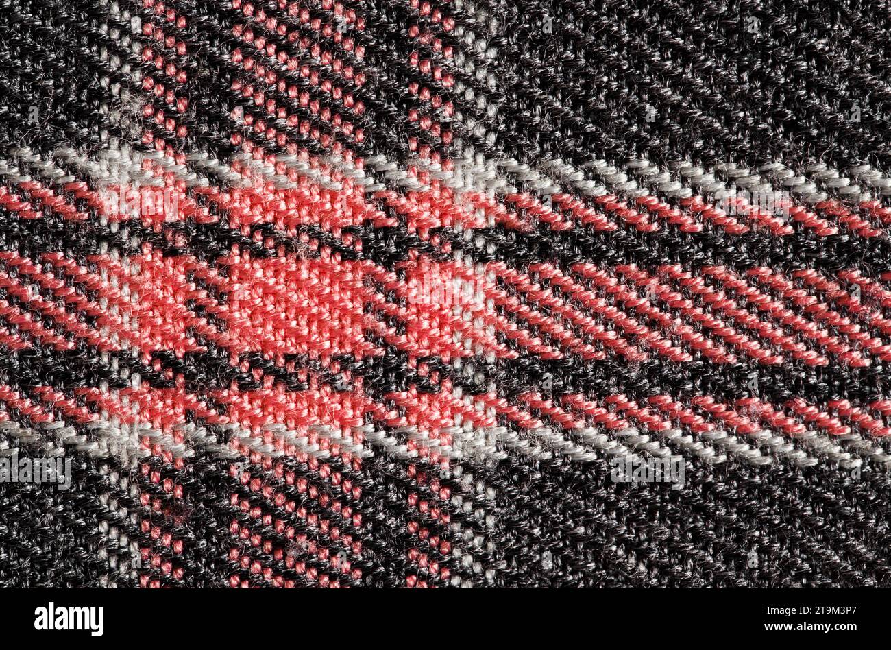 Fabric with checkered pattern red, background structure, , close-up macro view Stock Photo
