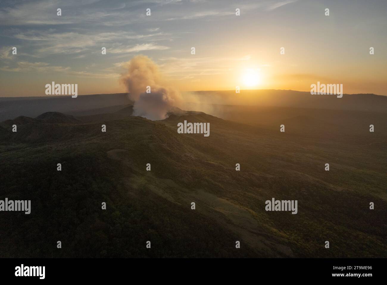 Smoke coming from volcano in Masaya Nicaragua aerial drone view Stock Photo