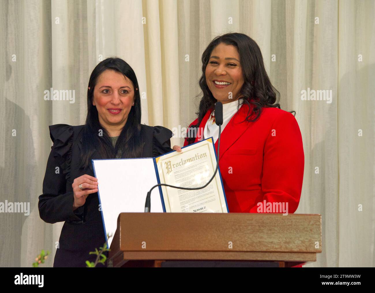 San Francisco, CA - March 24, 2023: Mayor London Breed presenting Nowruz holiday declaration to Sepideh Nasiri, CEO and Founder of Persian Women in Te Stock Photo