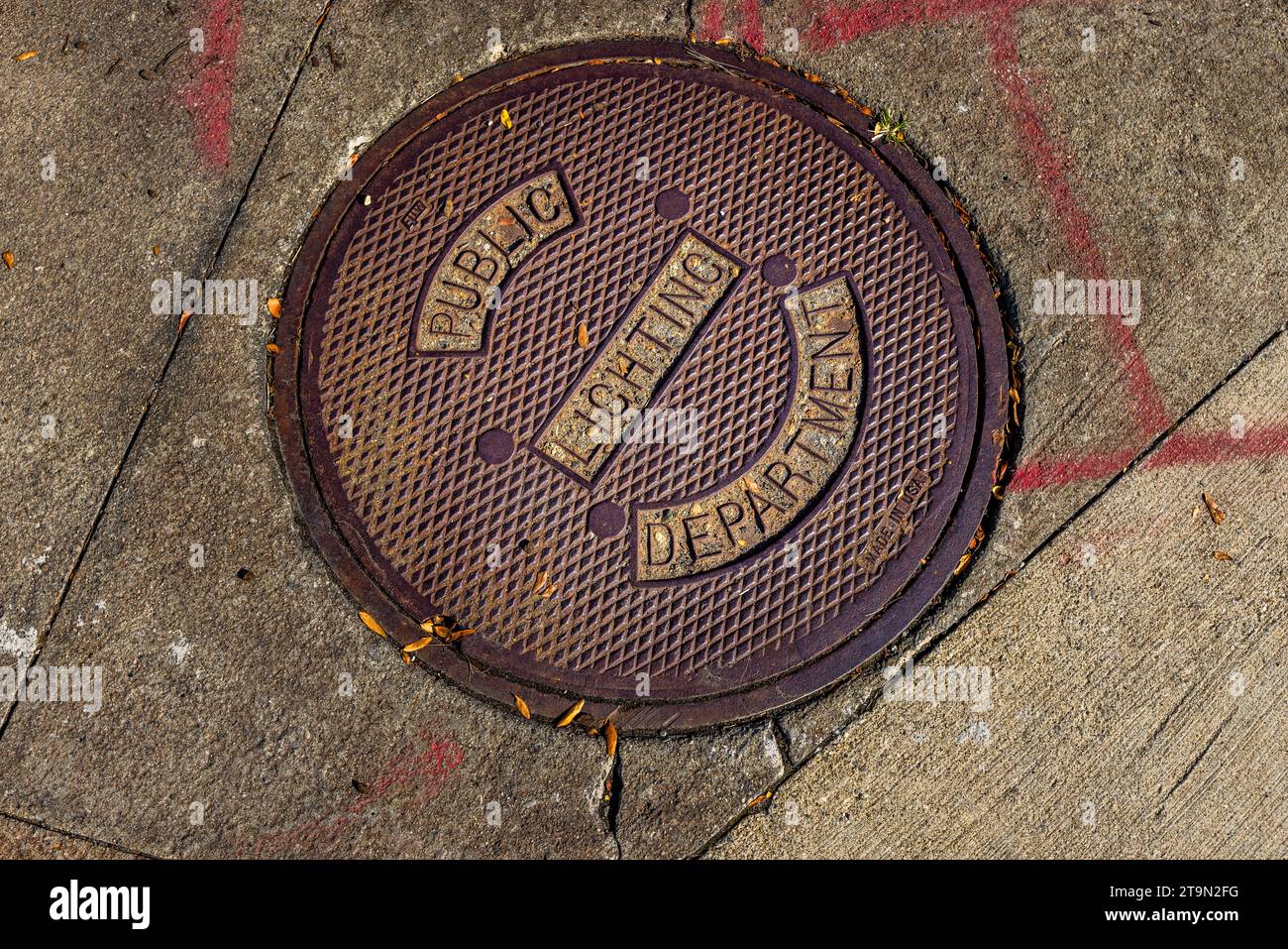 Manhole Cover in Detroit, United States. Public Lighting Department Stock Photo