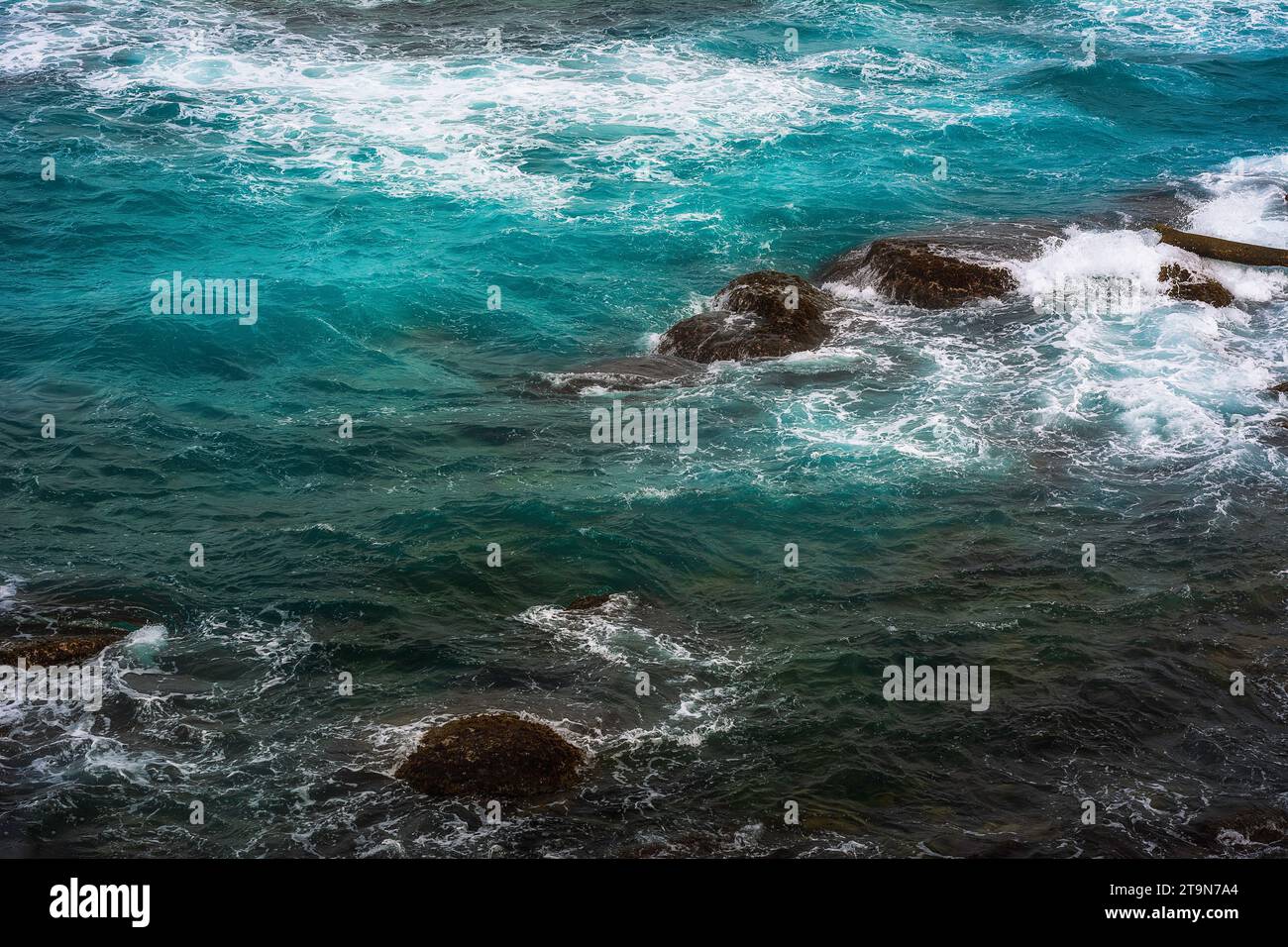 The colors of the Caribbean, intense blue in the sea of the Tayrona National Natural Park Stock Photo