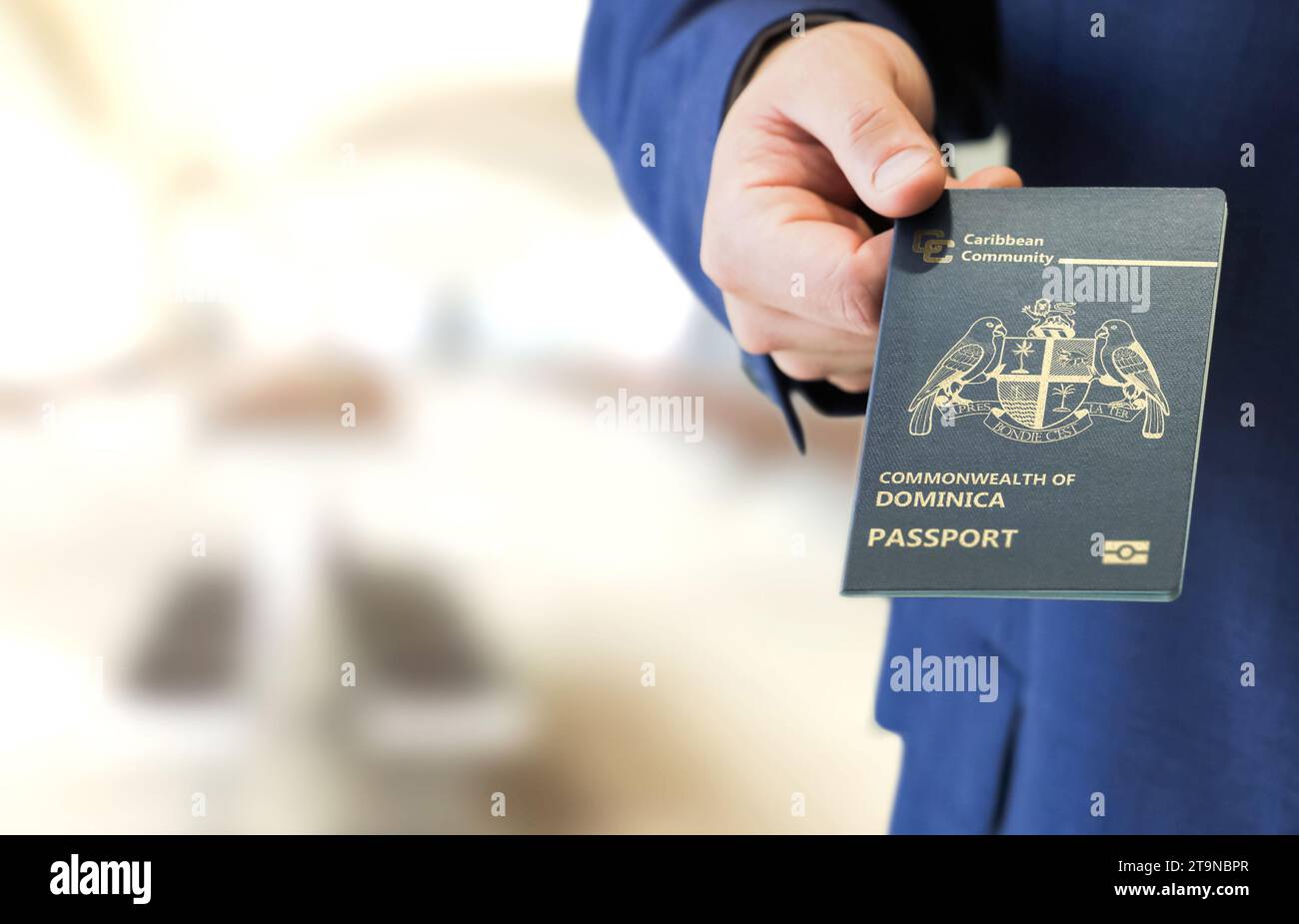 A businessman with a Dominica passport, citizenship through investment Stock Photo