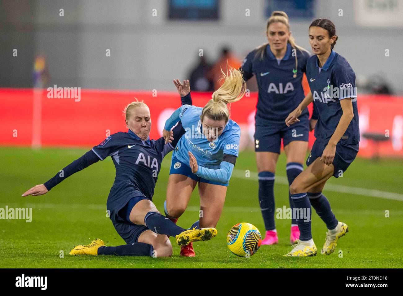Manchester on Saturday 25th November 2023.Lauren Hemp #11 of Manchester City tackled by the opponents during the Barclays FA Women's Super League match between Manchester City and Tottenham Hotspur at the Joie Stadium, Manchester on Saturday 25th November 2023. (Photo: Mike Morese | MI News) Credit: MI News & Sport /Alamy Live News Stock Photo