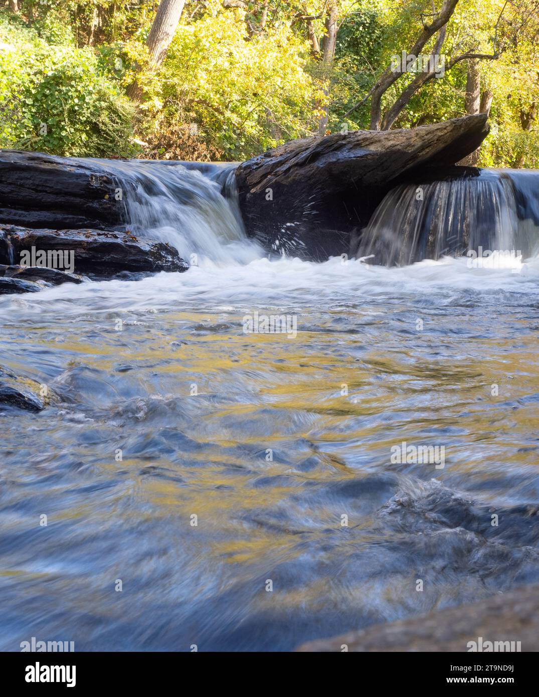 Stoacked Rocks Stream leaves tumbling over rocks hi-res stock photography and images ...