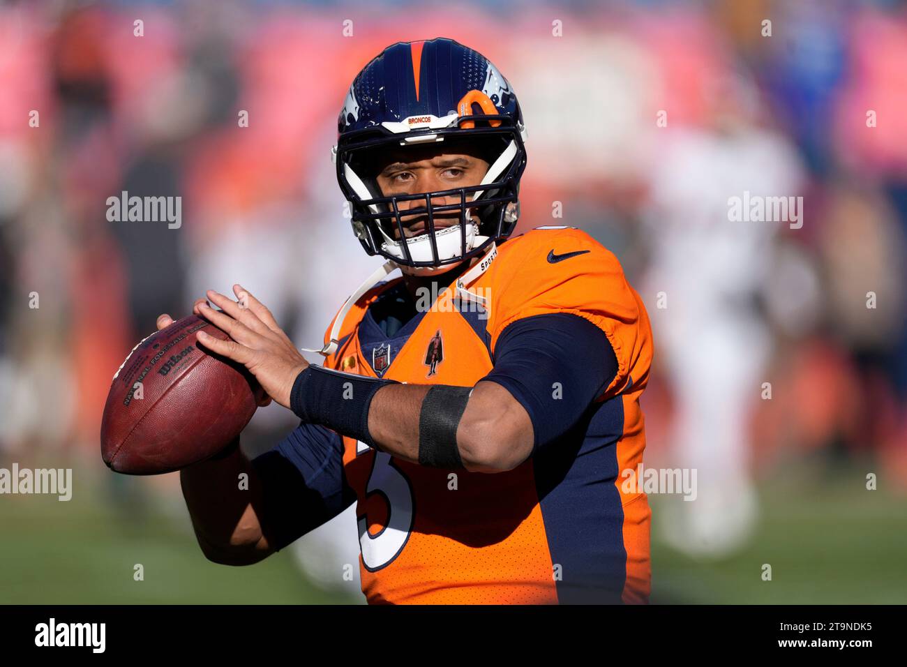 Denver Broncos quarterback Russell Wilson warms up before the start of ...