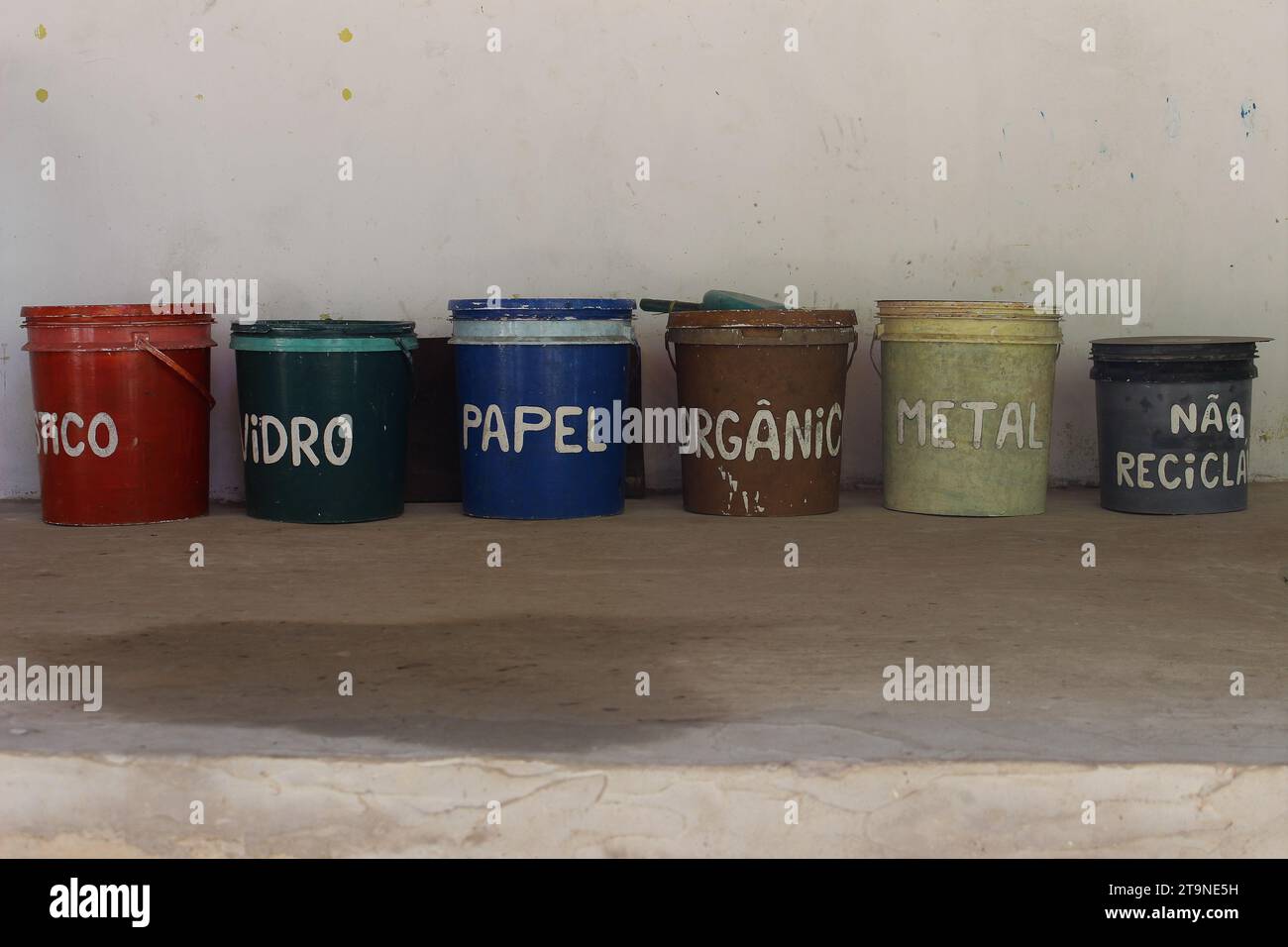 Simple, colorful and handcrafted selective collection bins for