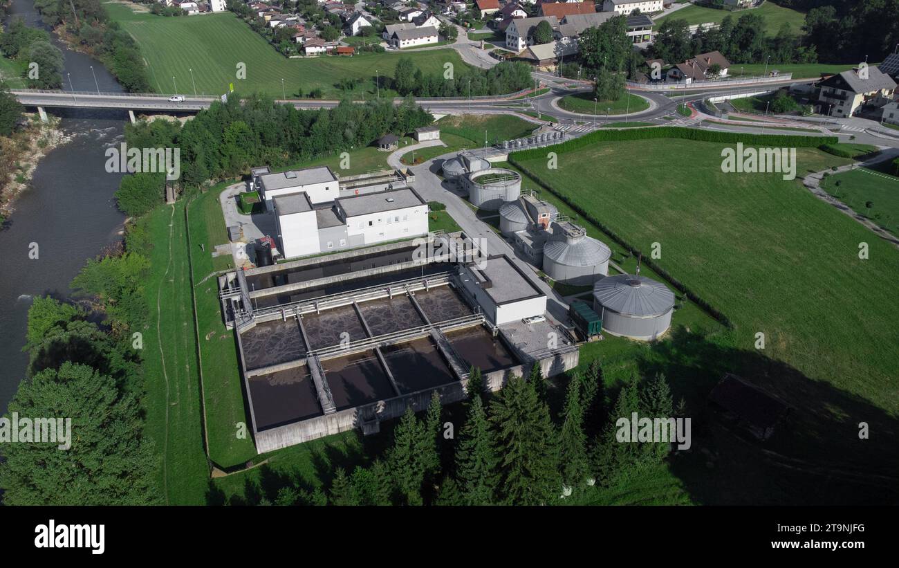 Aerial drone view of waste water cleaning facility with visible towers ...