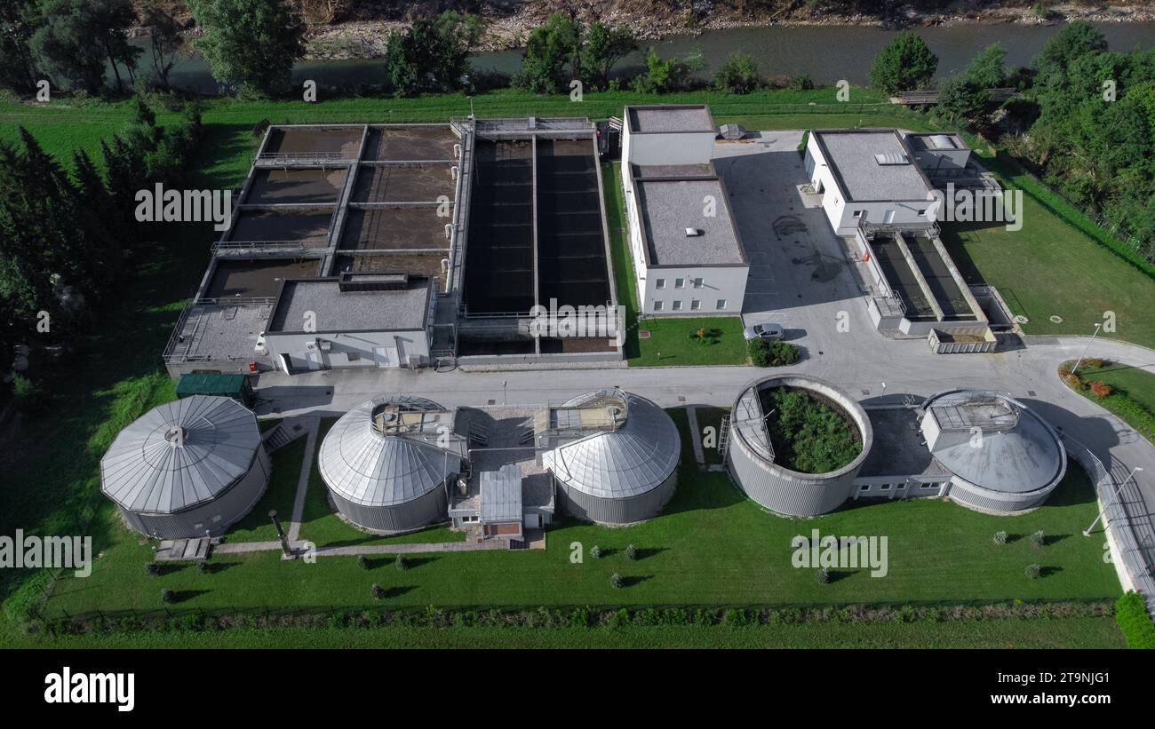 Aerial drone view of waste water cleaning facility with visible towers ...