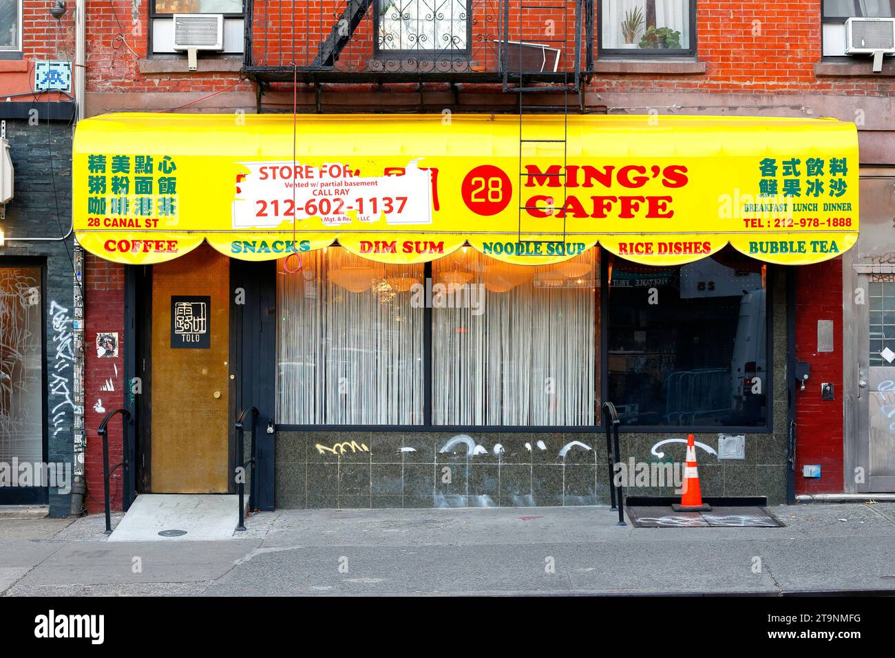 Tolo, 28 Canal St, New York, NYC storefront photo of a Chinese American restaurant and wine bar in Manhattan's Lower East Side. Stock Photo