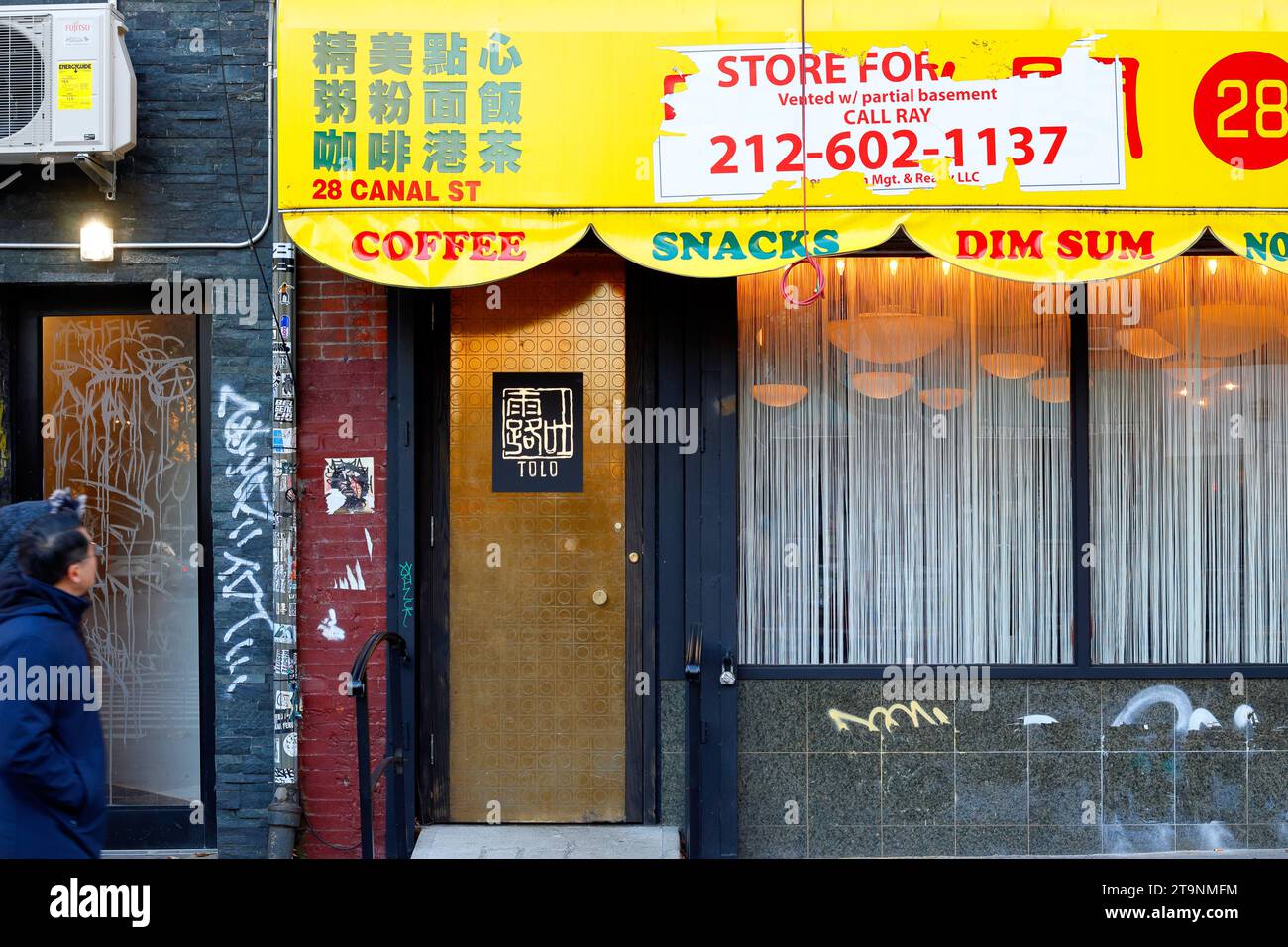 Tolo, 28 Canal St, New York, NYC storefront photo of a Chinese American restaurant and wine bar in Manhattan's Lower East Side. Stock Photo