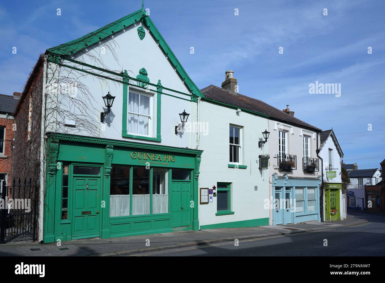 Ireland, small town main street with colorful old shops and restaurants Stock Photo