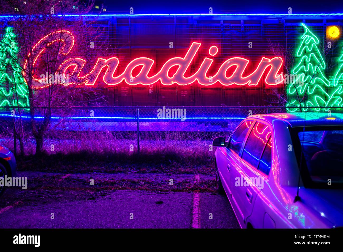 The CPKC, Canadian Pacific Holiday Train with Christmas decorations, Christmas lights in London, Ontario, Canada Stock Photo