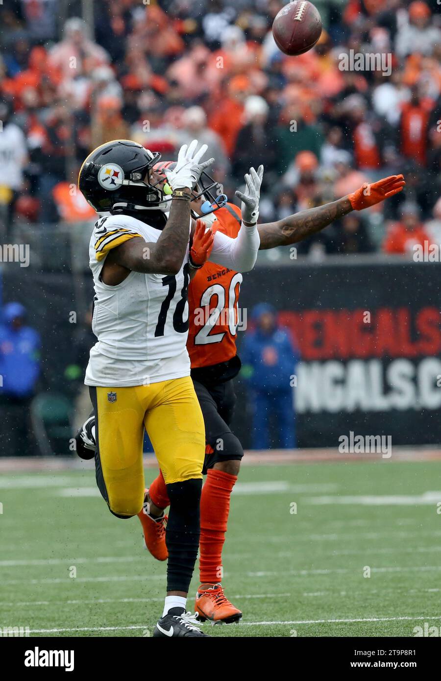 Cincinnati, United States. 26th Nov, 2023. Pittsburgh Steelers wide receiver Deontae Johnson (18) makes the catch under pressure from Cincinnati Bengals DJ Turner (20) during the first half of play at Paycor Stadium on Sunday, November 26, 2023 in Cincinnati. Ohio. Photo by John Sommers II/UPI Credit: UPI/Alamy Live News Stock Photo