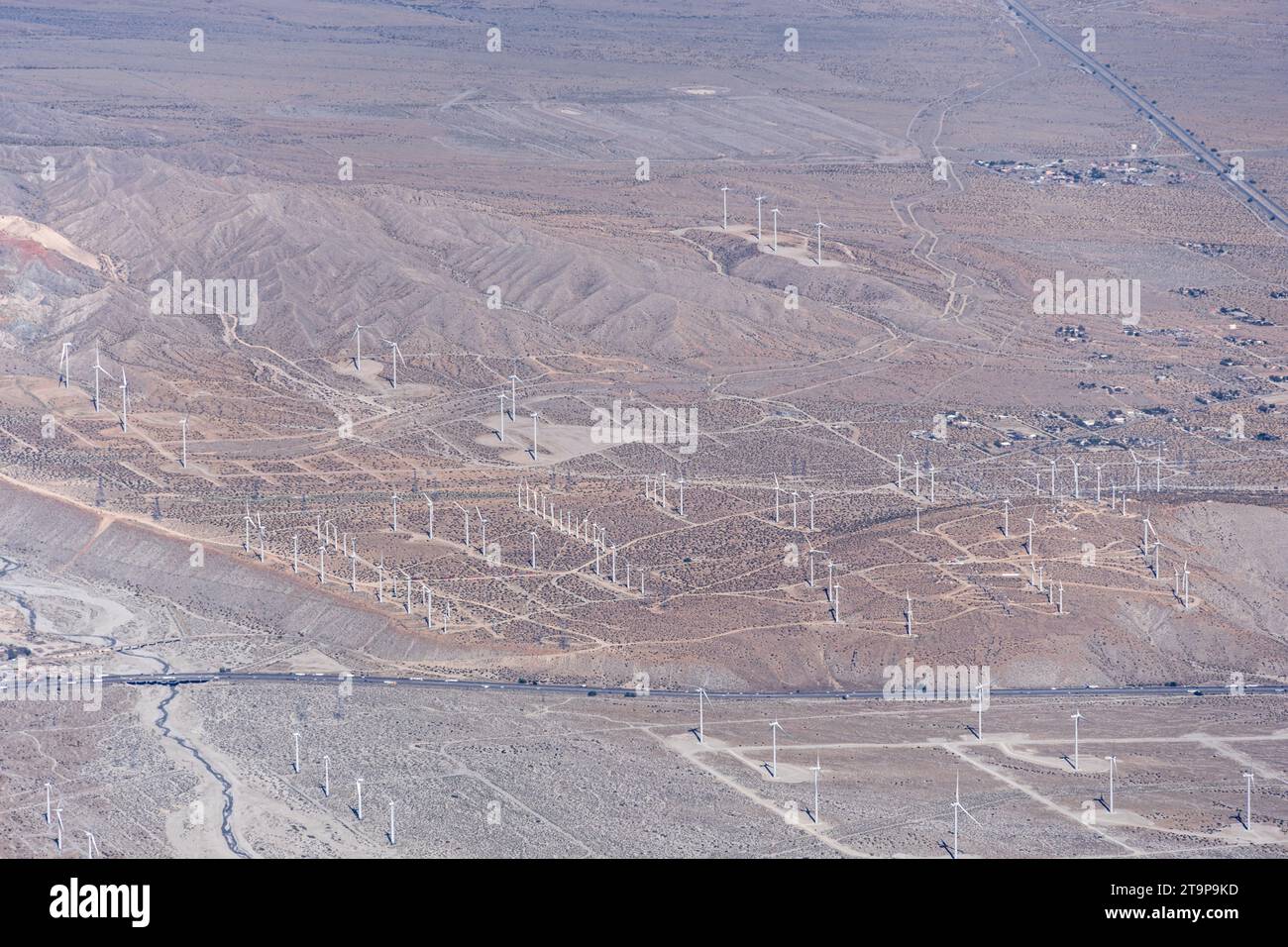 San Gorgonio or Banning Pass Wind Farm with multiple wind turbines and I-10 viewed from San Jacinto Peak Stock Photo