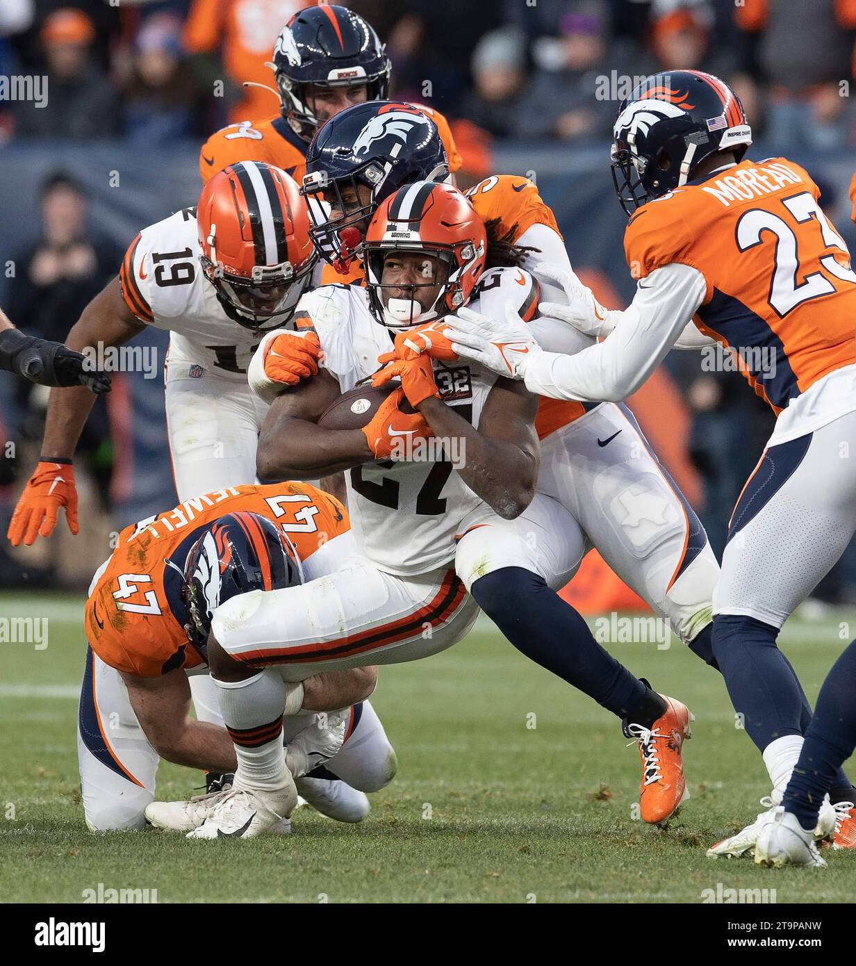 Denver, Colorado, USA. 26th Nov, 2023. Browns RB KAREEM HUNT gets gang tackled by the Broncos