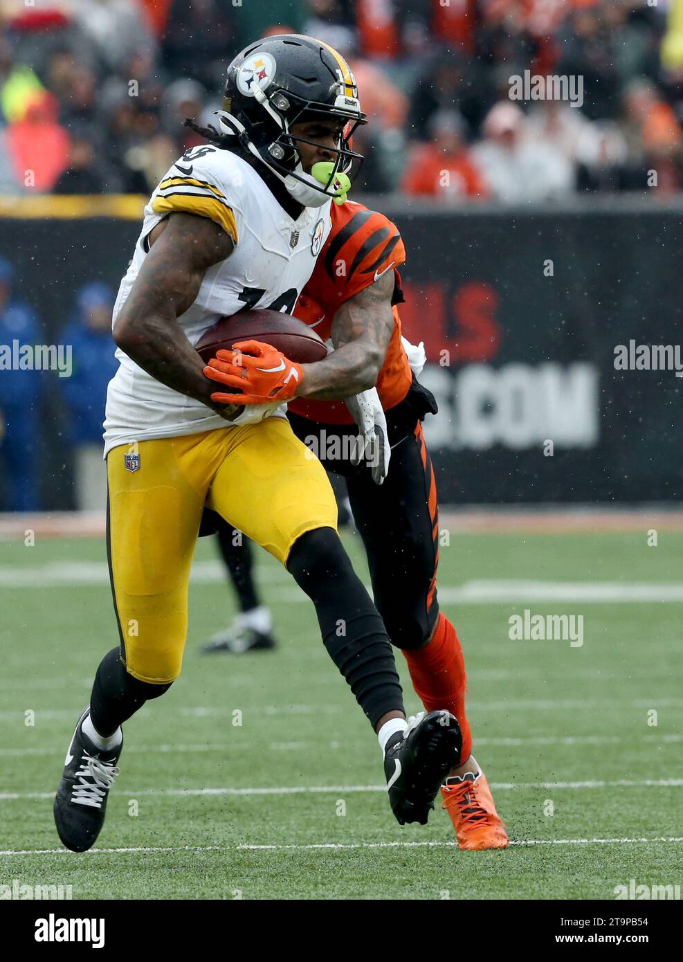 Cincinnati, United States. 26th Nov, 2023. Pittsburgh Steelers wide receiver Deontae Johnson (18) makes the catch under pressure from Cincinnati Bengals DJ Turner (20) during the first half of play at Paycor Stadium on Sunday, November 26, 2023 in Cincinnati. Ohio. Photo by John Sommers II/UPI Credit: UPI/Alamy Live News Stock Photo