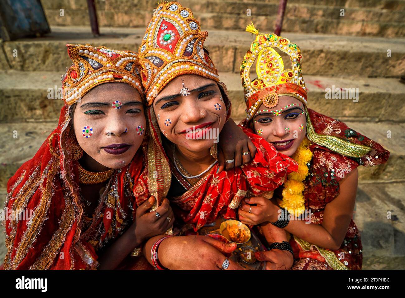 Varanasi, India. 25th Nov, 2023. Little children dressed as Hindu Mythological Characters to collect offerings during the festival. Dev Deepavali/Diwali is the biggest festival of light celebration in Kartik Poornima (Mid-Autumn) where devotees decorate the river bank with millions of lamps during the festival. Credit: SOPA Images Limited/Alamy Live News Stock Photo