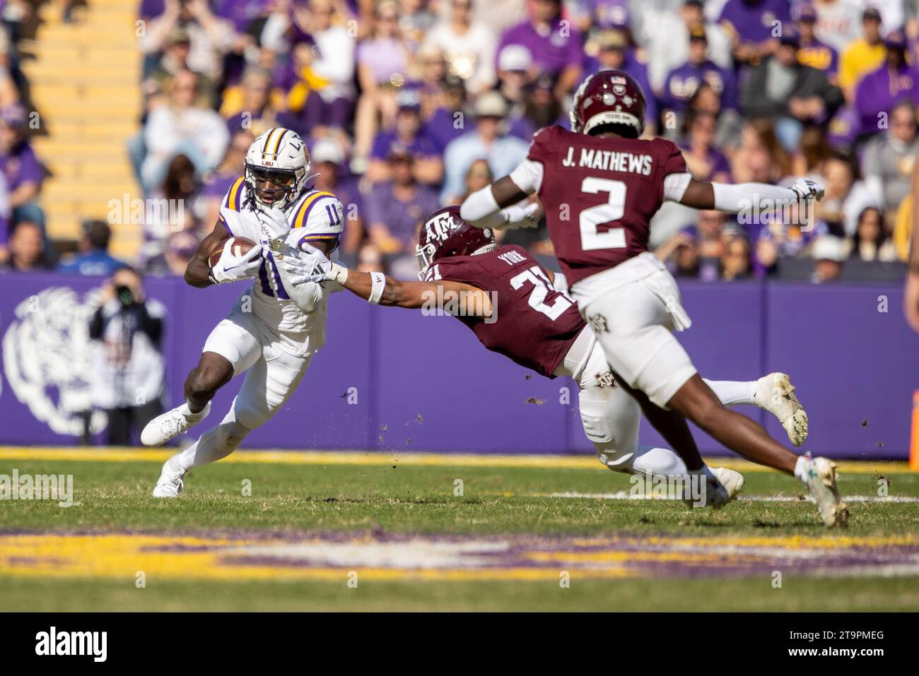 LSU Tigers wide receiver Brian Thomas Jr. (11) runs after the catch as