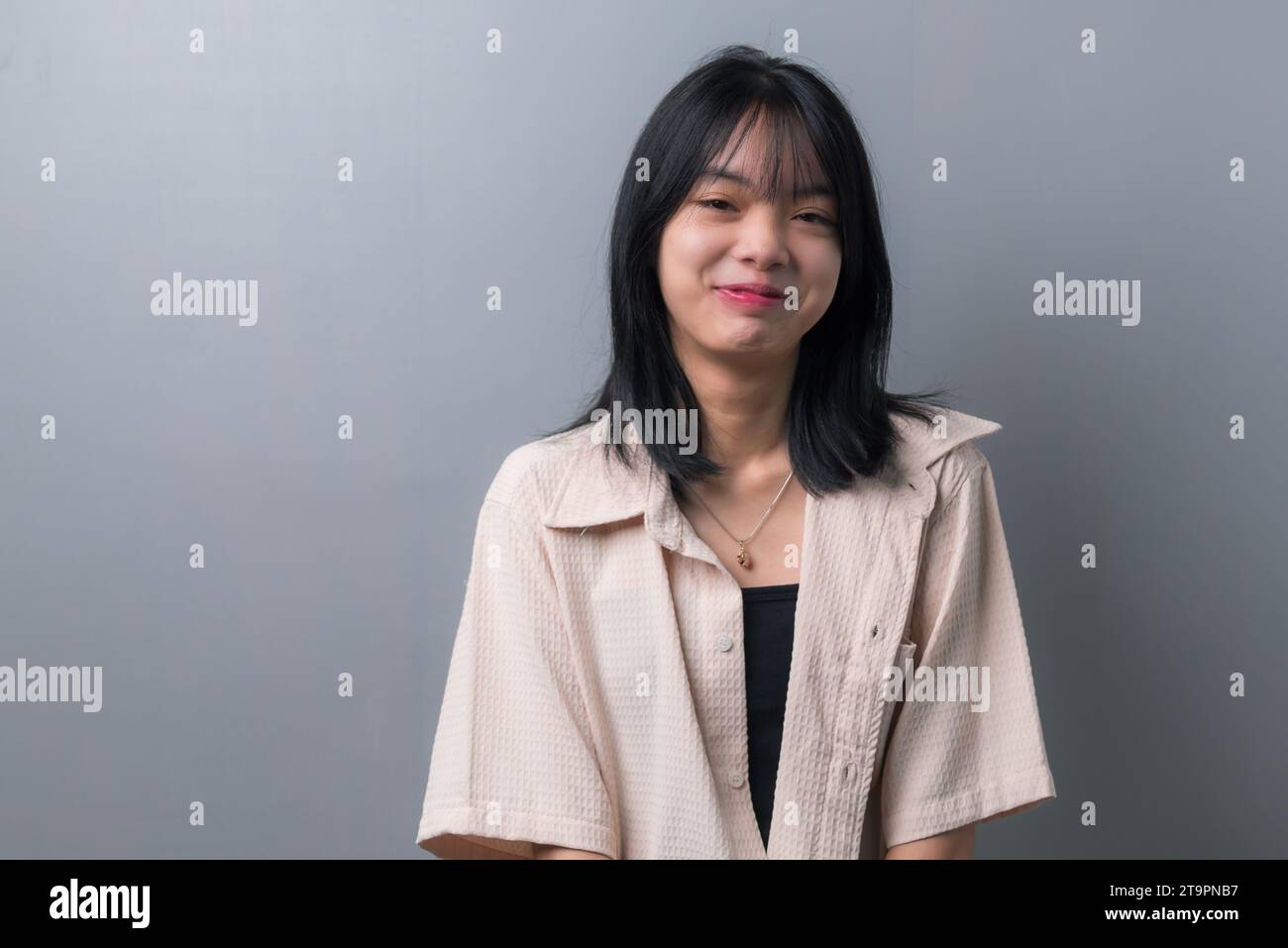 Happy Asian Teen Girl in Closeup Portrait on background Stock Photo - Alamy