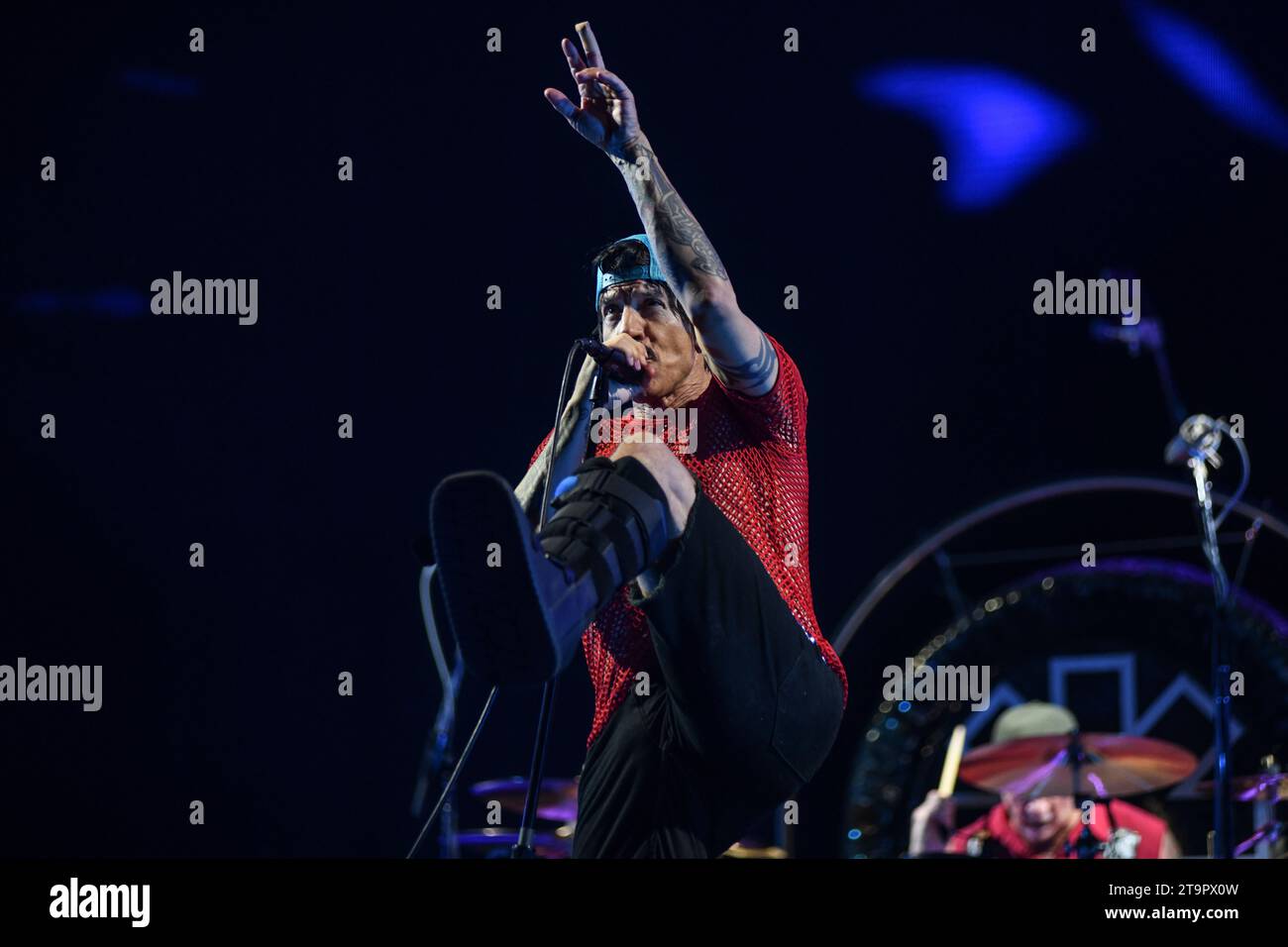 Anthony Kiedis (vocals) performing with a orthopedic walking Anthony Kiedis (vocals) performing with a orthopedic walking