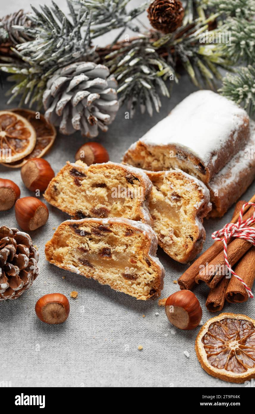 Traditional  stollen fruit cake. Christmas stollen with winter holidays decoration Stock Photo