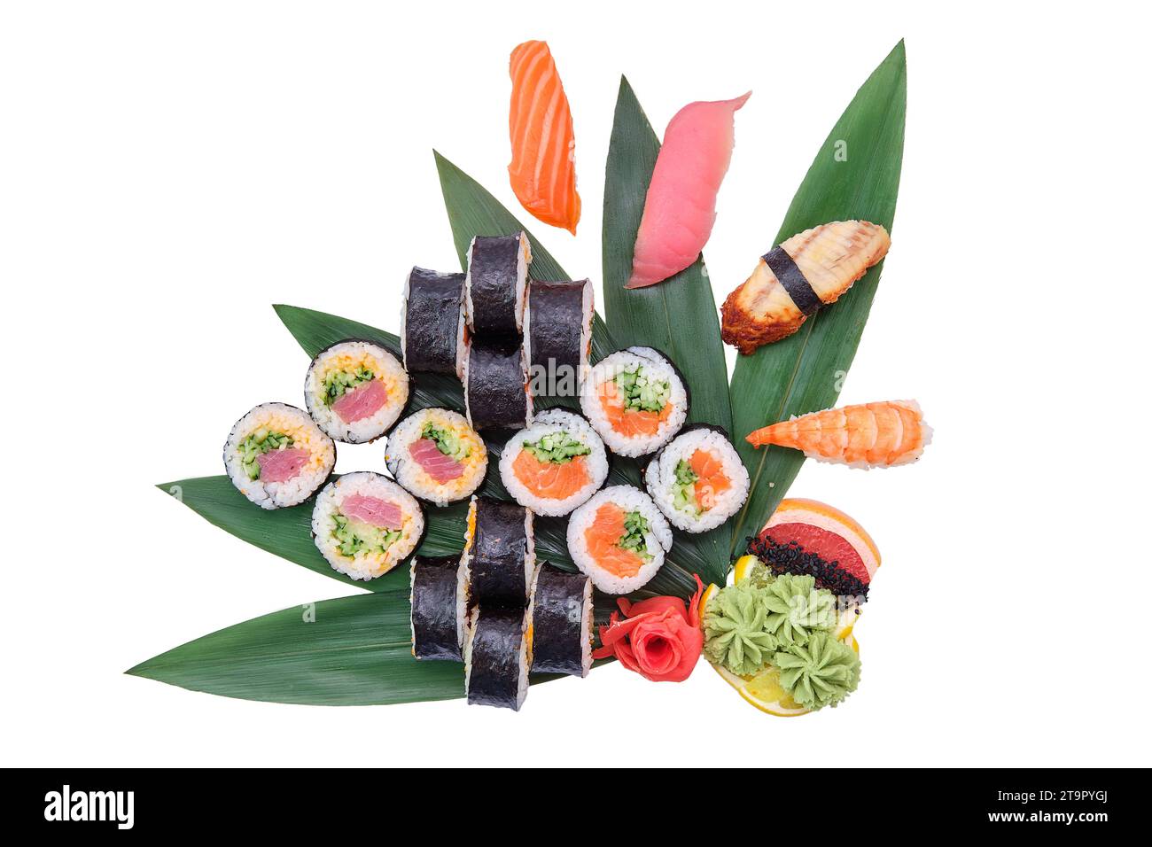 Overhead view of big set of sushi and rolls served on bamboo leaves Stock Photo