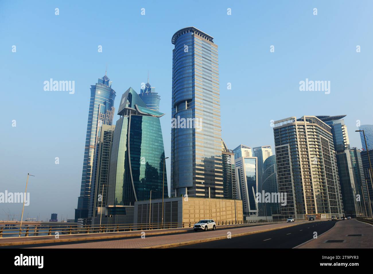 Modern skyscrapers changing the skyline of Business Bay in Dubai, UAE. Stock Photo