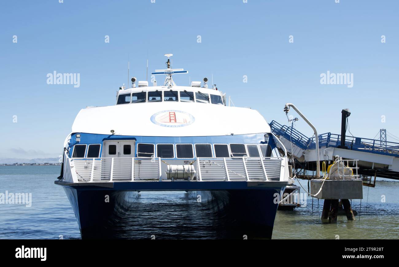 San Francisco, CA - July 13, 2023:   Golden Gate Ferry docked at the terminal. offers cruises with dramatic views of the Golden Gate Bridge, Alcatraz, Stock Photo