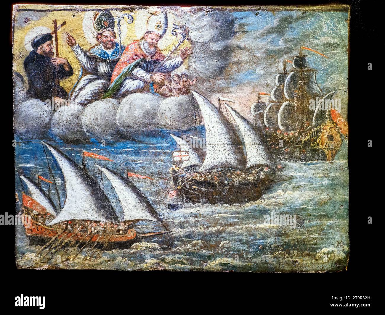 Christian ship attacked by pirates. S. Gerlando, S. Francesco and S. Nicola. Agrigento manufacturing. Oil on pressed cardboard, 18th century - Diocesan Museum of Agrigento - Sicily, Italy Stock Photo