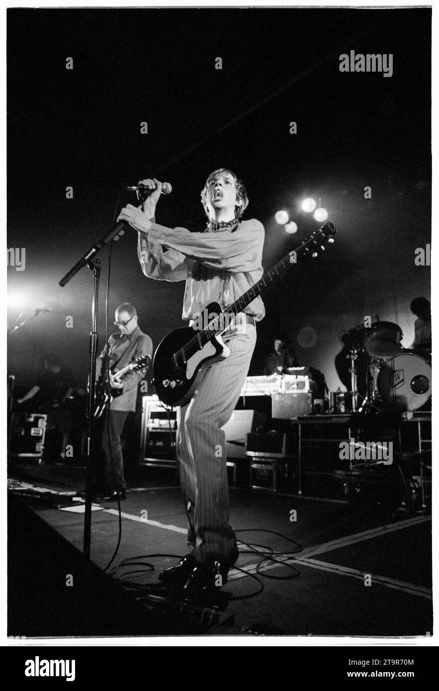 BECK, SINGER, 1997: Beck plays a one-off gig at Cardiff University to publicise the Odelay album on 3 March, 1997. The star only played two dates in the UK on this visit. The concert featured an incredible extended guitar battle with Beck on guitar and a champion scratch DJ manipulating a guitar chord on the decks. Photo: Rob Watkins Stock Photo