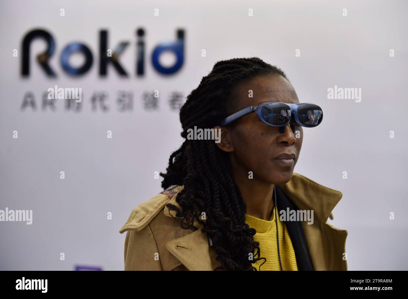Hangzhou, China's Zhejiang Province. 24th Nov, 2023. A visitor tries on AR glasses at the second Global Digital Trade Expo in Hangzhou, east China's Zhejiang Province, Nov. 24, 2023. Credit: Liu Lingyi/Xinhua/Alamy Live News Stock Photo