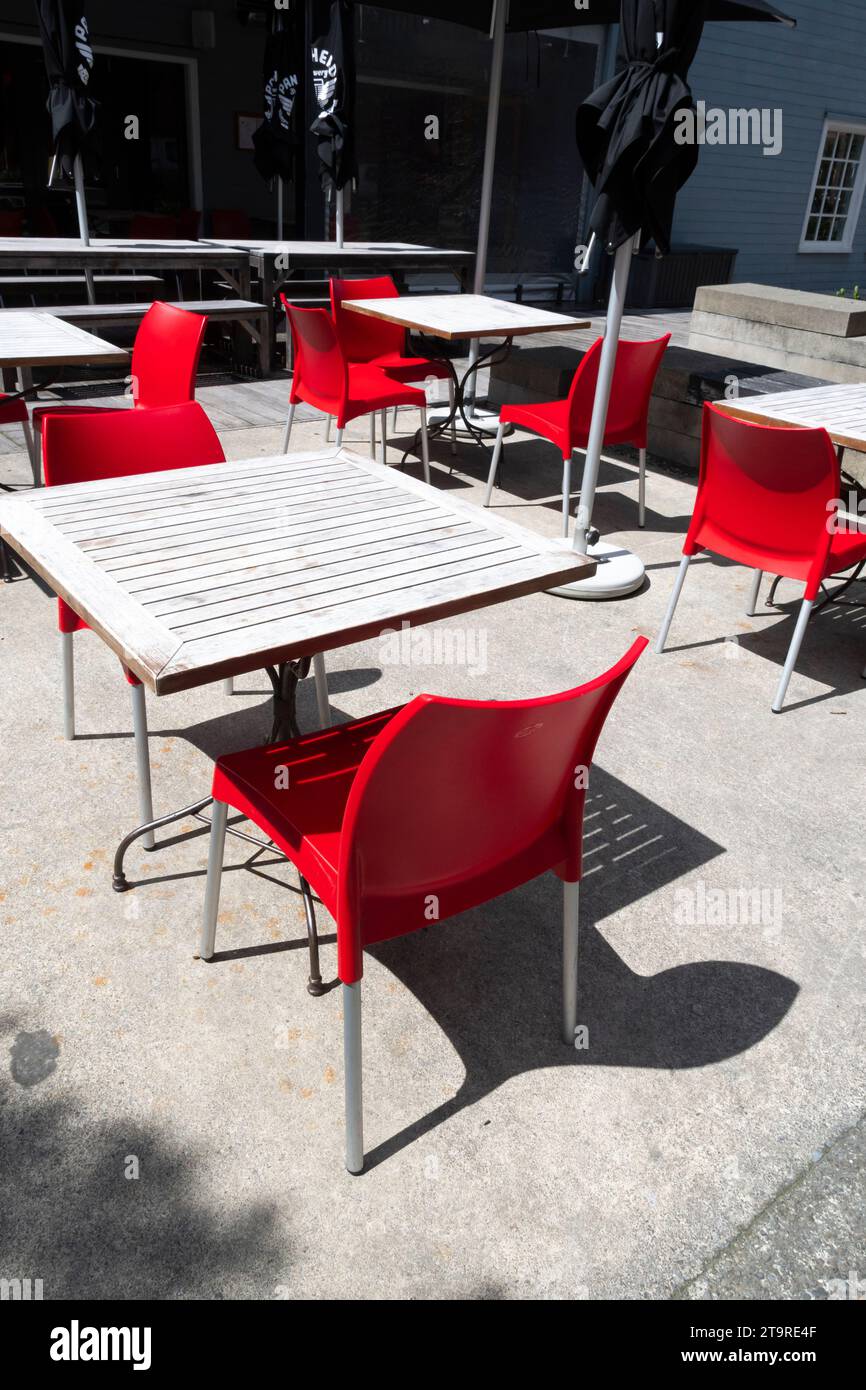 Red chairs and tables outside cafe, Wellington, North Island, New