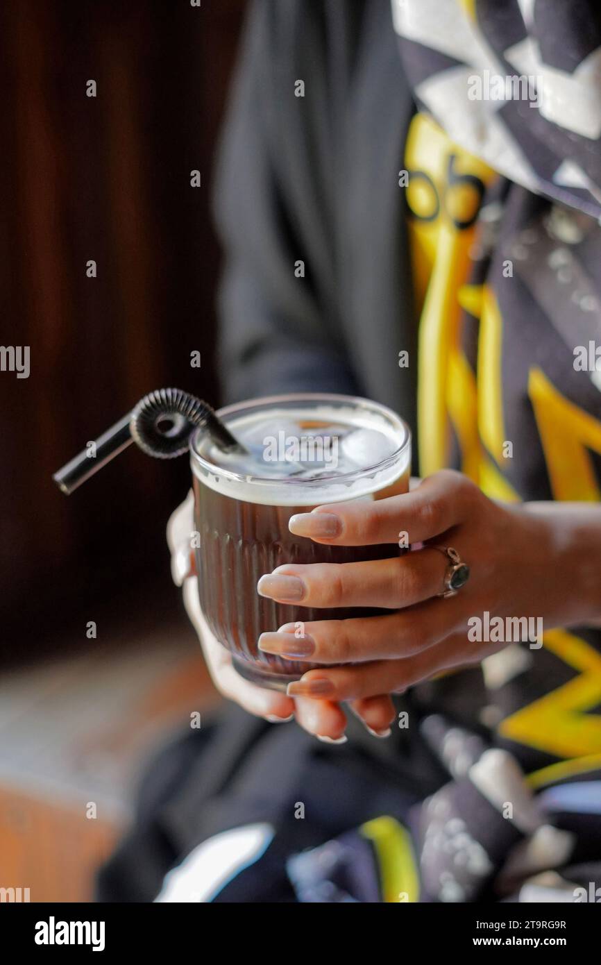 Caucasian handsome bearded man barista making cold iced coffee cappuccino  latte in shaker. Waiter server pouring drink in plastic transparent cup.  Sma Stock Photo - Alamy