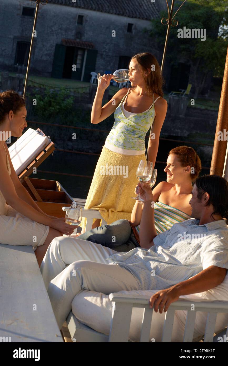 Friends having drinks in Carmelo, Uruguay. Stock Photo
