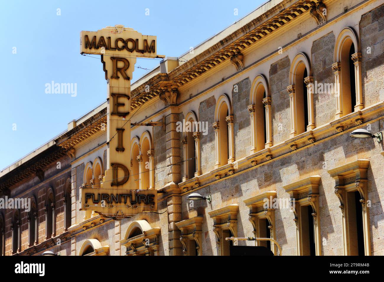 A retro sign with the name Malcolm Reid Furniture in Adelaide