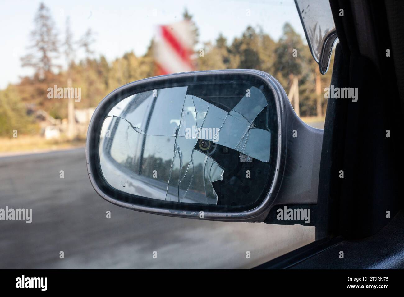 Broken rearview mirror. Crack on the glass of the vehicle Stock Photo