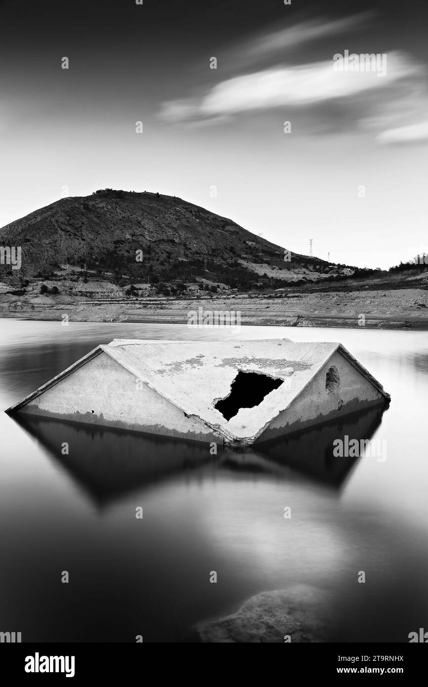 Flooded house in the Villajoyosa reservoir Stock Photo